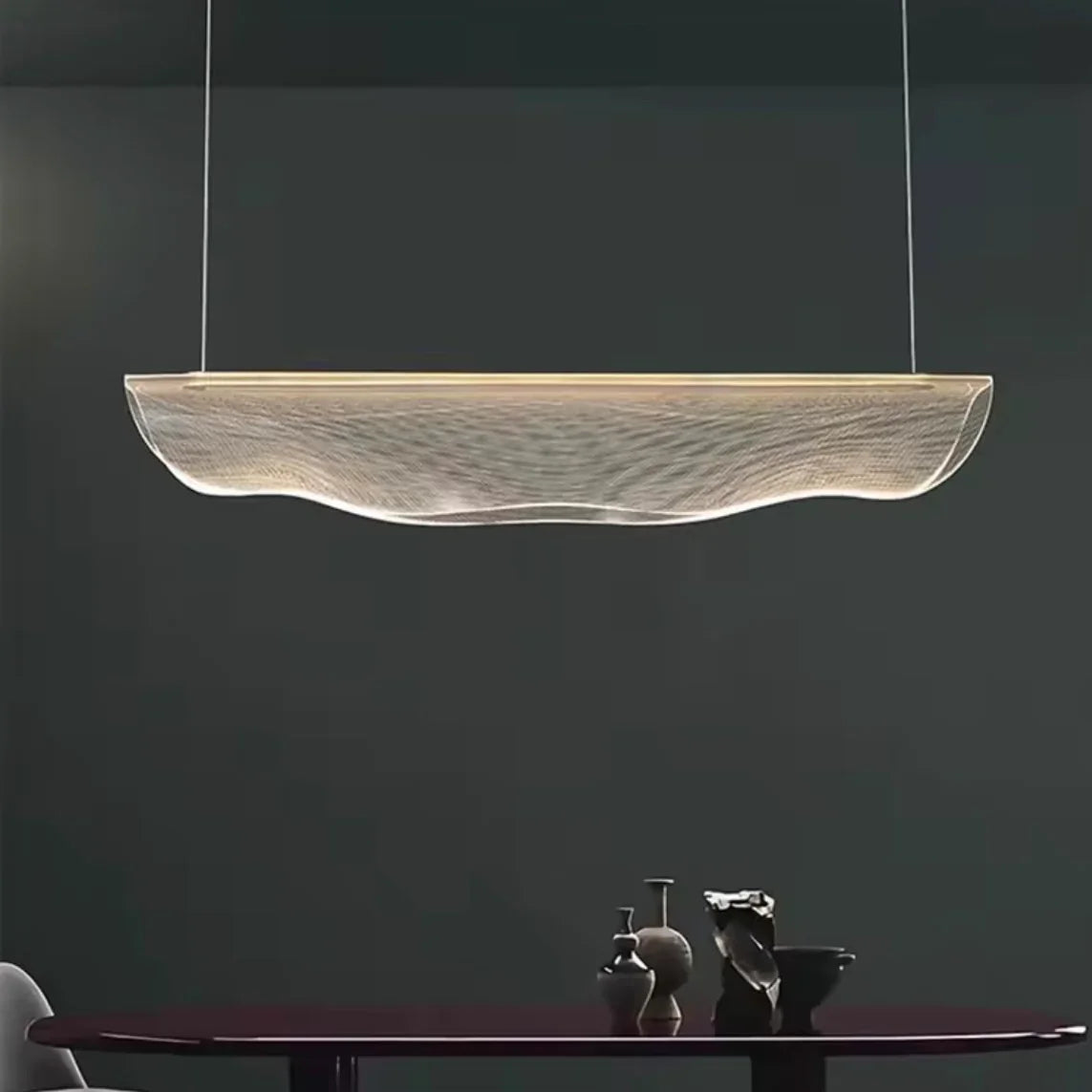 Ethereal Pebble organic LED pendant light above kitchen table