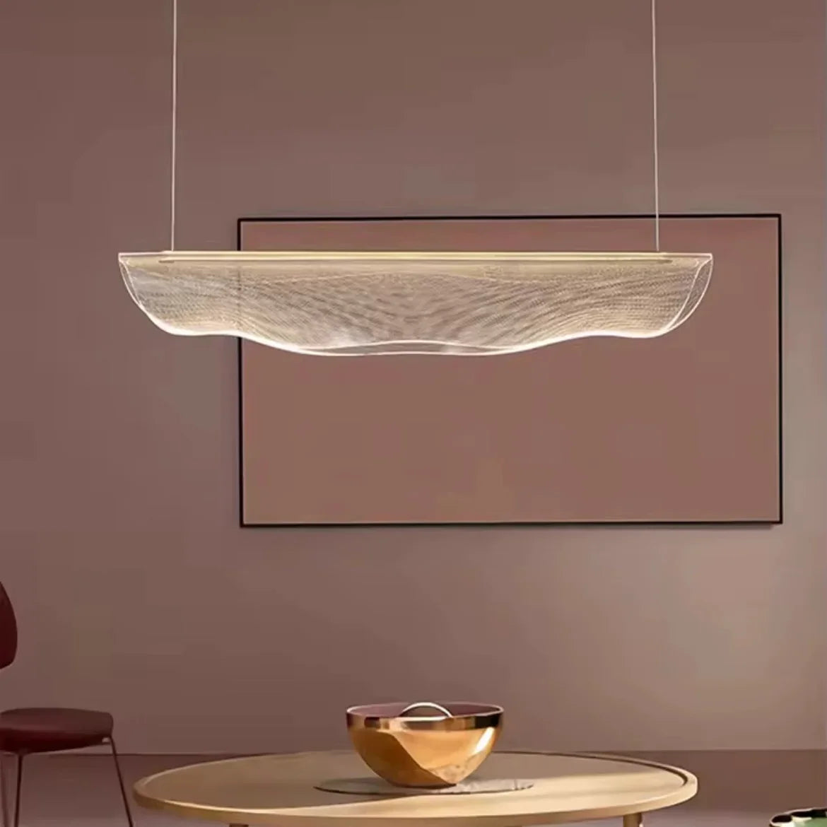 Ethereal Pebble organic LED pendant light above kitchen table